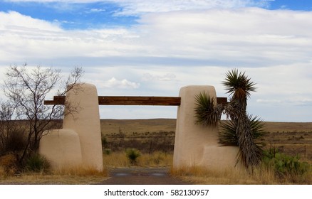 Adobe Ranch Gate Yucca Trees Cactus Cloud Blue Sky Vista in West Texas