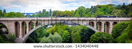 Adolphe Bridge at Luxembourg city. It was built between 1900 and 1903. The bridge was named after Grand Duke Adolphe, who reigned Luxembourg from 1890 until 1905