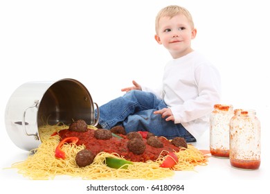 Adorable 2 Year Old Boy Sitting In Huge Spaghetti Mess Over White Floor.