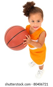 Adorable 3 Year Old Toddler Girl Child In Team Uniform Holding Basketball Over White Background.