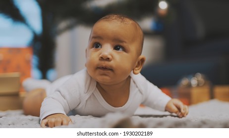 Adorable African American Black Baby Enjoying Tummy Time. High Quality Photo