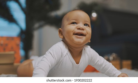 Adorable African American Black Baby Enjoying Tummy Time. High Quality Photo