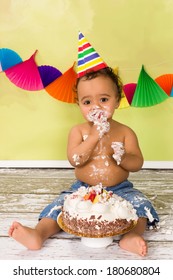 Adorable African Baby During A Cake Smash On His First Birthday