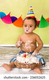 Adorable African Baby During A Cake Smash On His First Birthday