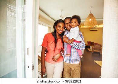 adorable african family in their home