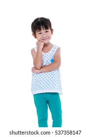 Adorable Asian Girl Thinking And Smiling. Thoughtful Child Looking At Camera, Isolated On White Background. Positive Human Emotion, Facial Expression Feeling Reaction. Studio Shot.