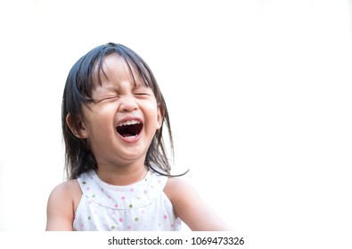 Adorable asian little girl is laughing with fully happiness moment, concept of happy and healthy kid lifestyle. - Shutterstock ID 1069473326