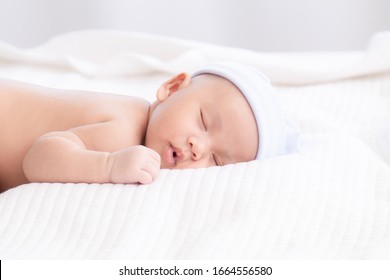 Adorable Asian Newborn Baby Deeply Sleeping Smile Easter Costume Hat, Tiny Infant Boy Soft Skin Healthy Sleep Dream On White Blanket On Bed Beautiful Sun Light, Newborn Baby Health Care Concept