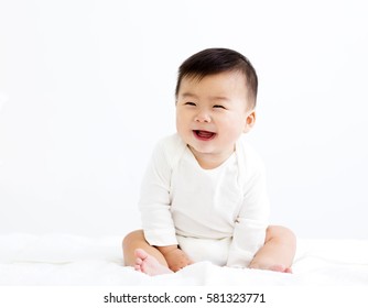 Adorable asian   smiling  baby  boy