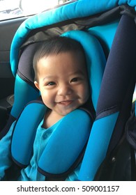 Adorable Baby Boy In His Blue Carseat