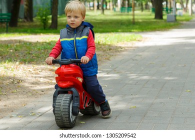 baby riding motorcycle