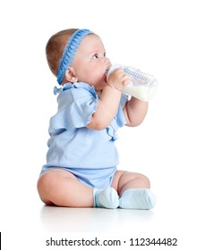 Adorable Baby Girl Drinking Milk From Bottle