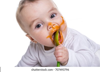 Adorable Baby Girl Making A Mess While Feeding