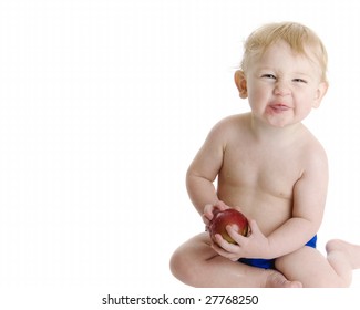 Adorable Baby Holding Apple Blowing Spit Bubbles