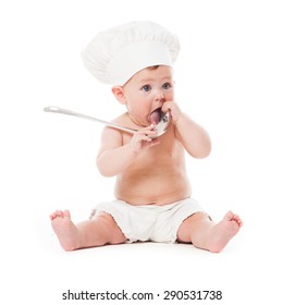 Adorable baby with metal ladle and cook hat isolated on white