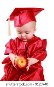 Adorable Baby In A Red Cap And Gown.