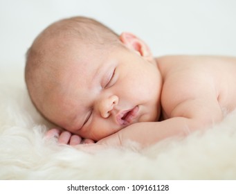 Adorable Baby Sleeping On Stomach