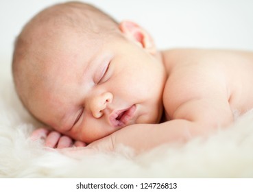 Adorable Baby Sleeping On Stomach