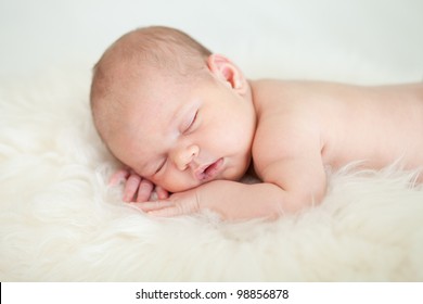 Adorable Baby Sleeping On Stomach