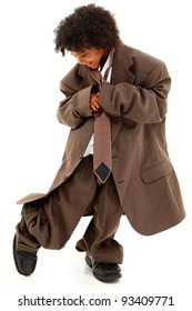 Adorable Beautiful Black Girl Child in Baggy Business Suit walking over white background.