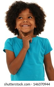 Adorable black girl child thinking with a smile over white.