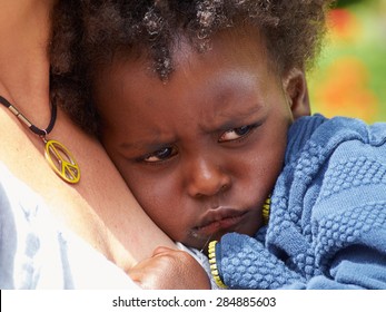 Adorable Black Sad Baby Crying With Bad Mood