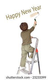 Adorable boy writing Happy New Year on a over white background