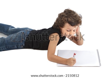 adorable boy writing over awhite back ground in order to be able to write the text in the notebook