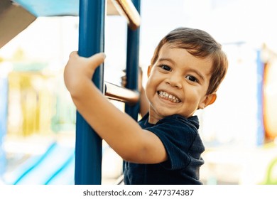 Adorable Brazilian boy playing at the park - Powered by Shutterstock