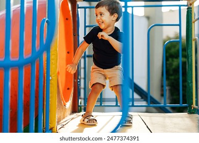 Adorable Brazilian boy playing at the park - Powered by Shutterstock