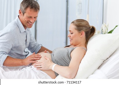 Adorable couple in a hospital room - Powered by Shutterstock