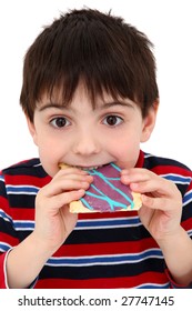 Adorable Five Year Old Boy Eating A Pop Tart.