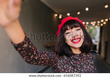 Adorable French Brunette Girl With Stylish Make Up And Short Hairstyle Having Fun With Camera Adorable French Brunette Girl With Stylish Make Up And Short Hairstyle Having Fun With Camera