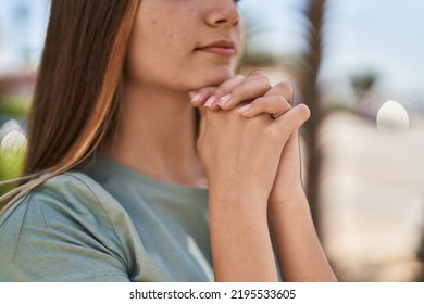 Adorable Girl Praying At Street