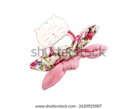 Adorable hair accessories featuring bunny ear knots on elastic bands with a cute animal shaped cardboard display
