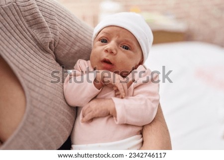 Similar – Baby taking feeding bottle