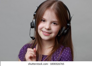 Adorable kid listen to the music and singing