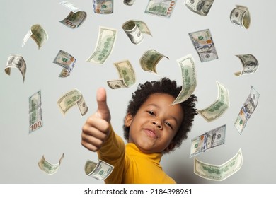 Adorable Kid Young Boy In The Rain Of Money On White Background