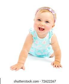 Adorable little baby girl laughing, creeping & playing in the studio, isolated on white background