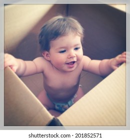 Adorable Little Baby Girl In Shipping Box - Instagram Effect