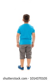 Adorable little boy looking at wall. Rear view, Isolated on white background  
