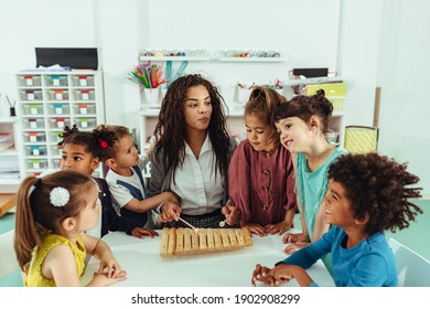 Adorable Little Children Their Teacher Playing Stock Photo 1902908299 ...