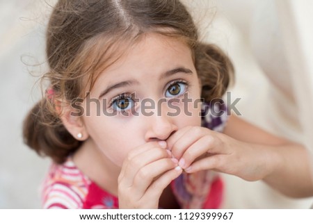 Adorable little girl combed with pigtails