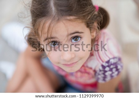 Image, Stock Photo Adorable little girl combed with pigtails