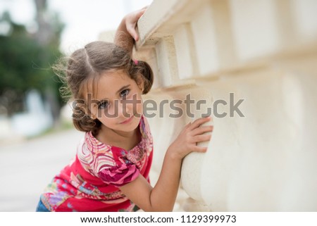 Image, Stock Photo Adorable little girl combed with pigtails