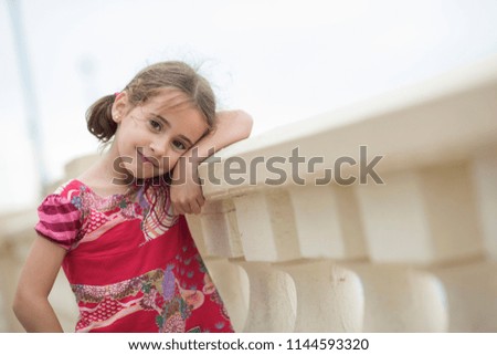 Similar – Image, Stock Photo Adorable little girl combed with pigtails