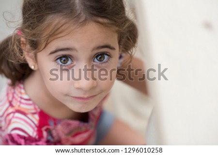 Similar – Adorable little girl combed with pigtails