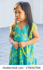 Adorable Little Girl Crying And Feeling Unhappy Stock Photo