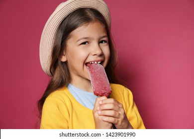 Adorable Little Girl With Delicious Ice Cream Against Color Background