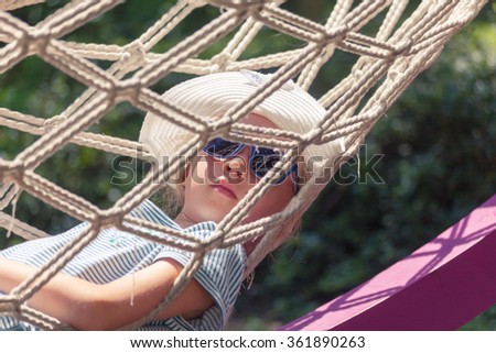 Similar – After this Photocase shock, I have to take a nap in the hammock.